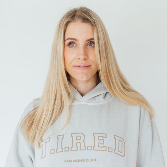 Jess Urlichs: T.I.R.E.D Grey hoodie